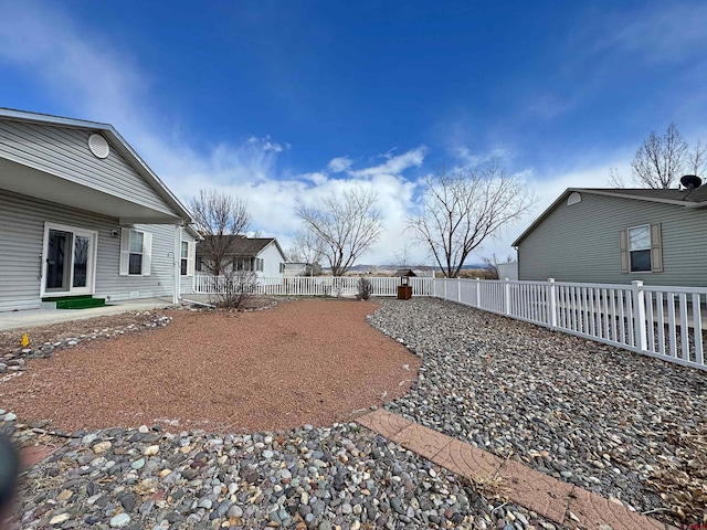 view of yard featuring a fenced backyard