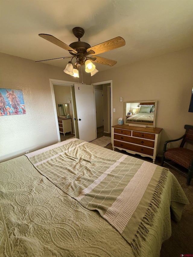 bedroom featuring ceiling fan and carpet floors