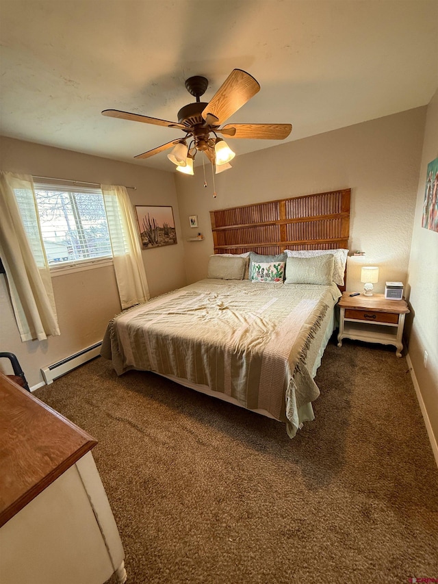 bedroom with a baseboard radiator, carpet floors, baseboards, and a ceiling fan