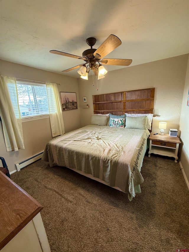 carpeted bedroom featuring a baseboard heating unit, baseboards, and ceiling fan