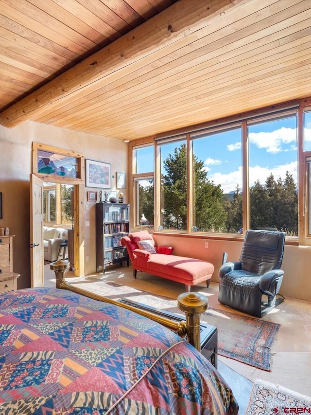 bedroom featuring beamed ceiling and wood ceiling