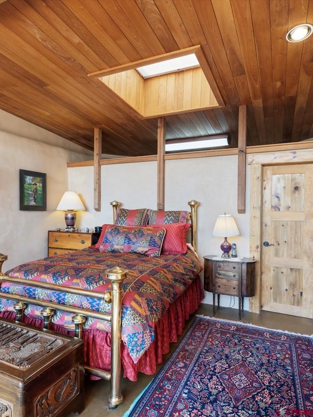 bedroom featuring wooden ceiling and vaulted ceiling