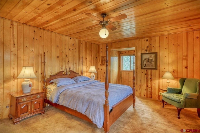 carpeted bedroom featuring wooden ceiling and ceiling fan