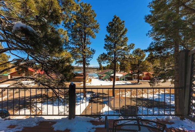 view of snow covered gate