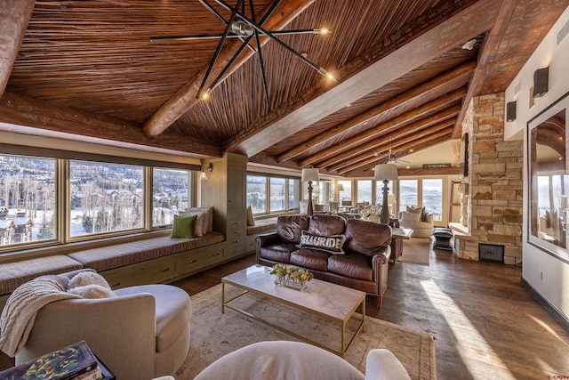 living area with a wealth of natural light, wood-type flooring, wooden ceiling, and vaulted ceiling with beams