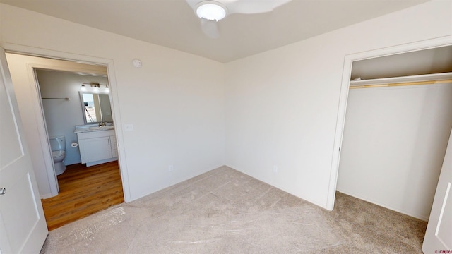 3601 Tinker Dr, Aztec, NM 87410 - unfurnished bedroom with a closet, carpet, and a sink