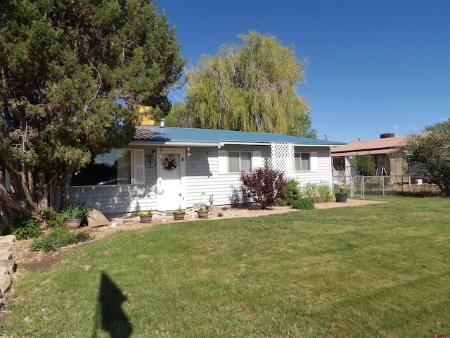 745 Hartig St, Delta, CO 81416 - view of front facade featuring metal roof