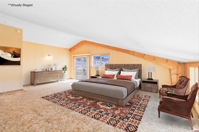 bedroom with vaulted ceiling, carpet flooring, baseboards, and a textured ceiling