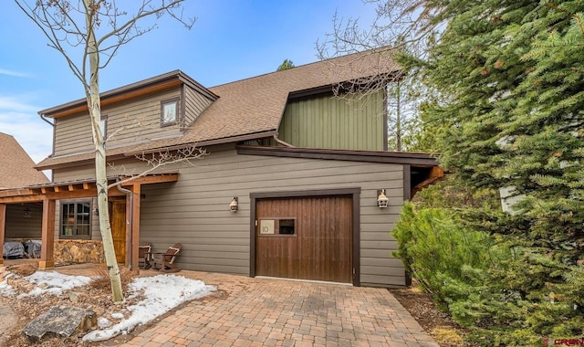 view of front of home with roof with shingles