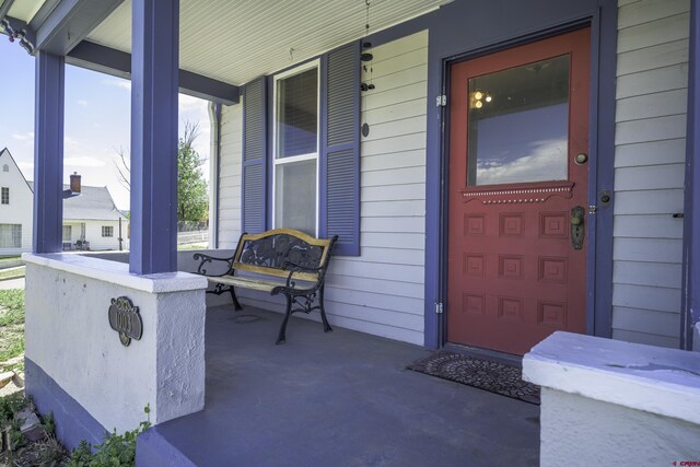 1003 San Juan St, Trinidad, CO 81082 - view of exterior entry with a porch