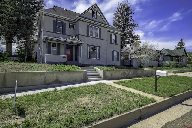 1003 San Juan St, Trinidad, CO 81082 - victorian house featuring a porch