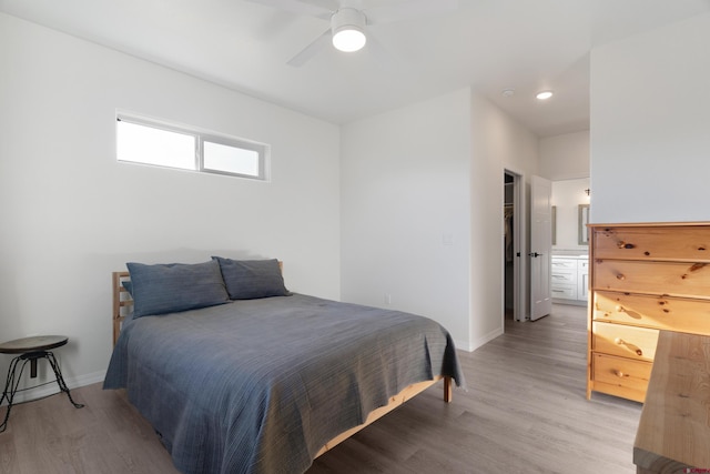 2305 Mountain Pines Dr, Montrose, CO 81401 - bedroom with baseboards, light wood finished floors, and ceiling fan