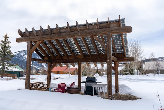 407 Cascadilla St, Crested Butte, CO 81224 - snow covered patio featuring a grill and a mountain view