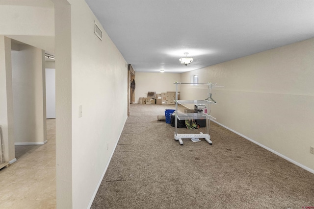 801 S Nevada Ave, Montrose, CO 81401 - interior space with baseboards, visible vents, and carpet