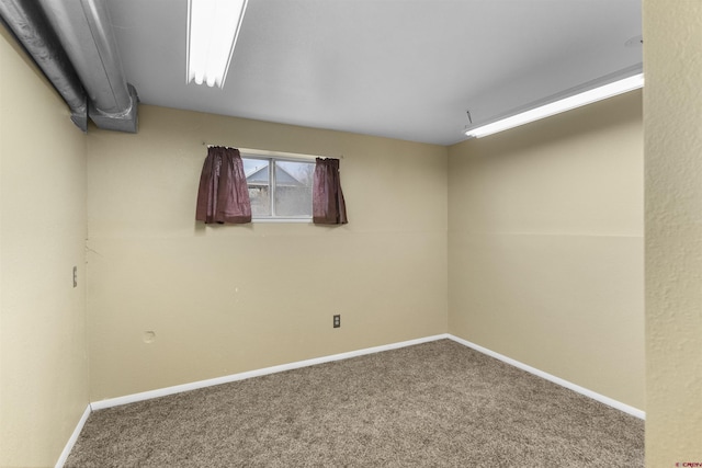 801 S Nevada Ave, Montrose, CO 81401 - carpeted spare room with baseboards