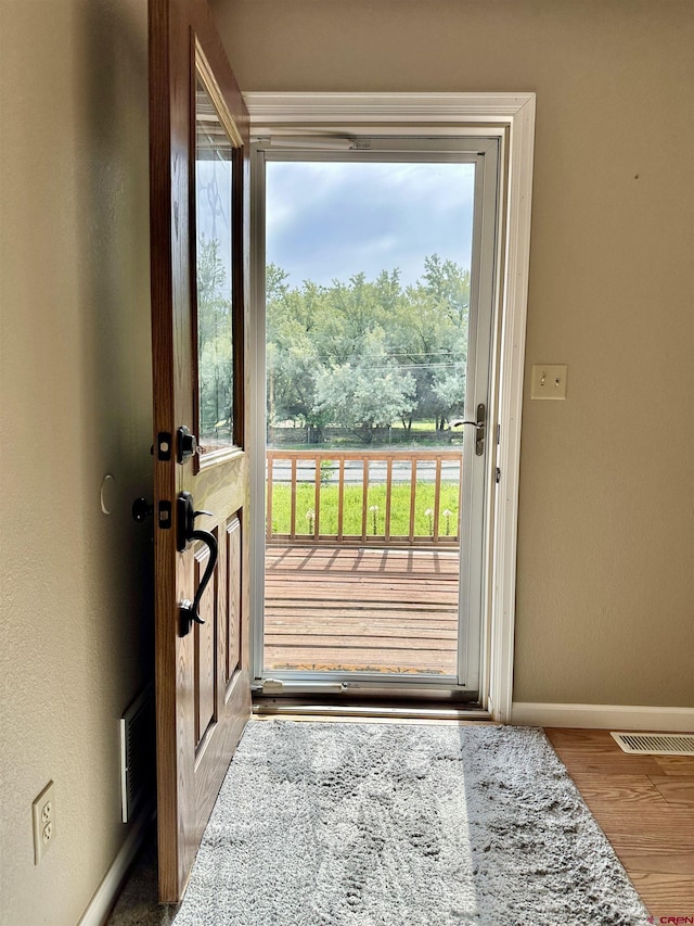 485 1740th Rd, Delta, CO 81416 - entryway featuring baseboards and wood finished floors