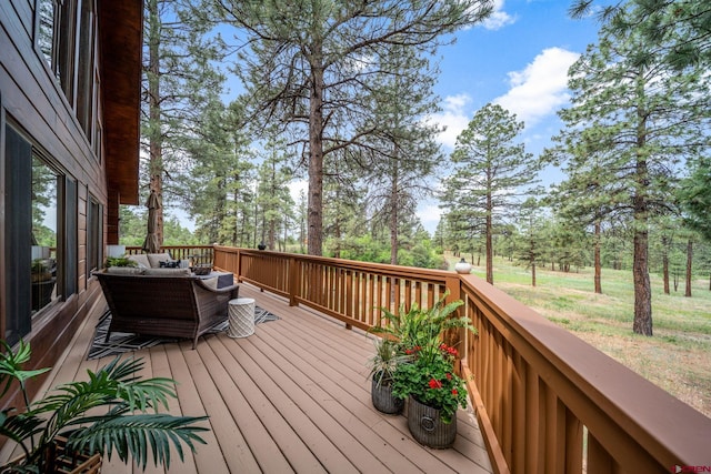 1838 Beaver Creek Dr, Bayfield, CO 81122 - wooden deck featuring an outdoor hangout area
