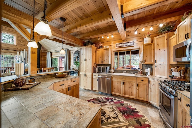 1838 Beaver Creek Dr, Bayfield, CO 81122 - kitchen with backsplash, hanging light fixtures, wood ceiling, a sink, and appliances with stainless steel finishes