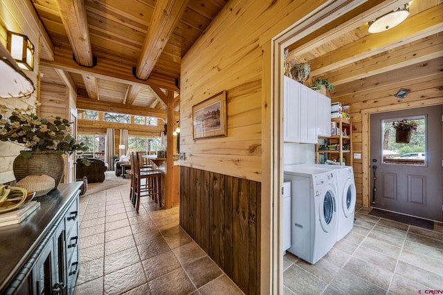 1838 Beaver Creek Dr, Bayfield, CO 81122 - washroom featuring wood ceiling, washer and clothes dryer, and wooden walls