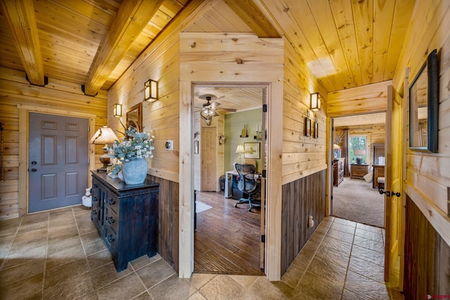 1838 Beaver Creek Dr, Bayfield, CO 81122 - hallway featuring wood ceiling, beam ceiling, and wooden walls
