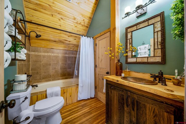 1838 Beaver Creek Dr, Bayfield, CO 81122 - bathroom with vanity, vaulted ceiling, toilet, shower / bath combo, and wood finished floors