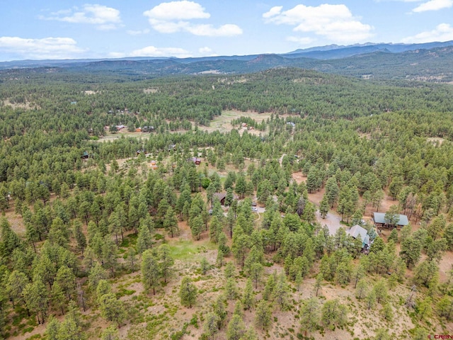 1838 Beaver Creek Dr, Bayfield, CO 81122 - birds eye view of property with a wooded view and a mountain view