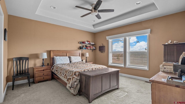 1241 Appaloosa St, Delta, CO 81416 - bedroom with a raised ceiling, light carpet, baseboards, and ceiling fan