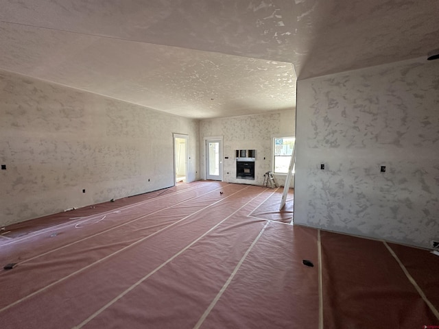 1533 Criterion St, Delta, CO 81416 - unfurnished living room featuring a glass covered fireplace