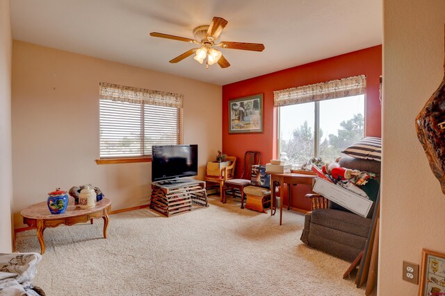 18725 Rd 25.8, Dolores, CO 81323 - carpeted living area featuring a ceiling fan