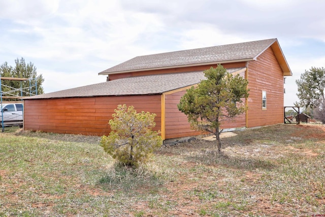 18725 Rd 25.8, Dolores, CO 81323 - view of side of property with a shingled roof