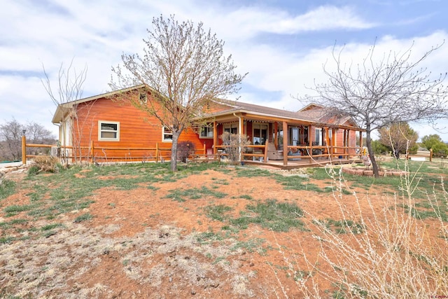 18725 Rd 25.8, Dolores, CO 81323 - rear view of property with a porch and fence