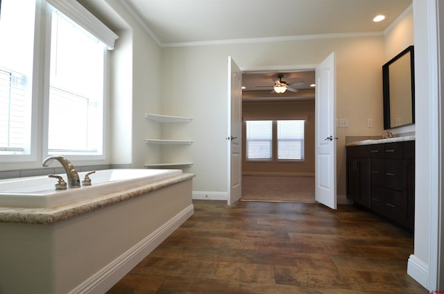 bathroom featuring wood finished floors, ceiling fan, baseboards, and ornamental molding