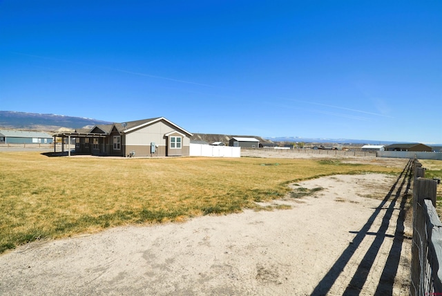 view of yard with fence