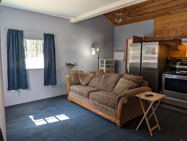 407 Simmons Dr, Pagosa Springs, CO 81147 - living area with carpet flooring, vaulted ceiling, and a ceiling fan