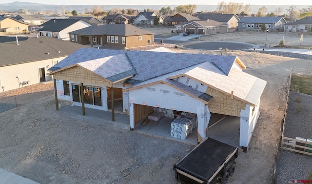 birds eye view of property with a residential view