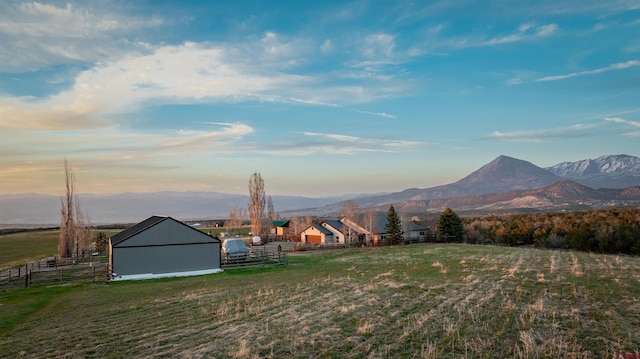 37835 Fruitland Mesa Dr, Crawford, CO 81415 - view of yard with a rural view, a mountain view, an outdoor structure, and fence