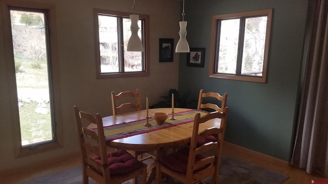 dining space with baseboards