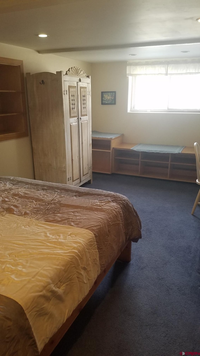 bedroom featuring carpet flooring