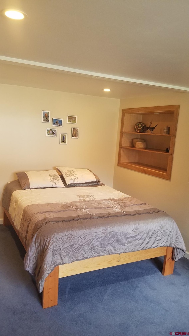 bedroom with baseboards, recessed lighting, and carpet flooring