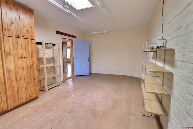 spare room with concrete floors