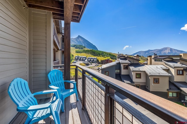 balcony featuring a mountain view