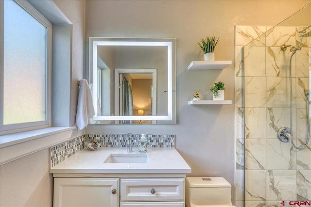 80 Cleek Ct, Pagosa Springs, CO 81147 - bathroom with a shower stall, plenty of natural light, vanity, and toilet