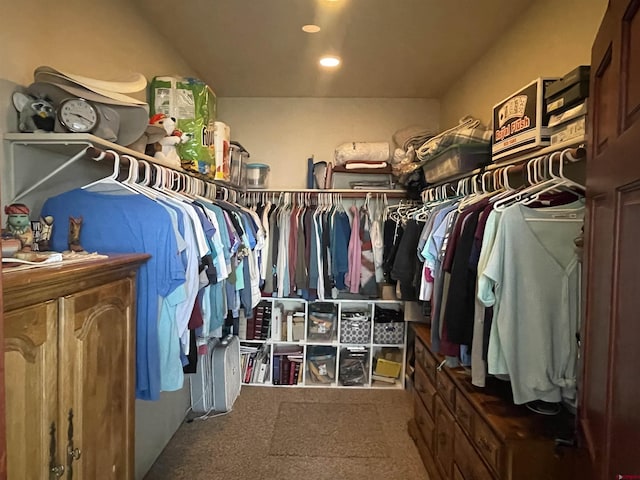 spacious closet with carpet floors