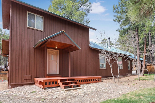 85 Dayspring Pl, Pagosa Springs, CO 81147 - rustic home featuring metal roof and fence