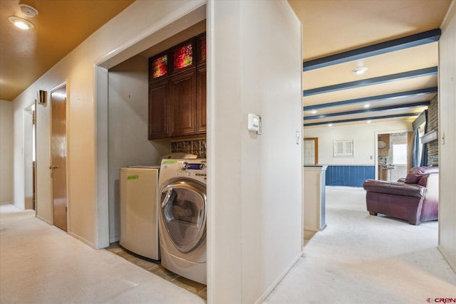 laundry room with light carpet, washer and dryer, recessed lighting, and cabinet space