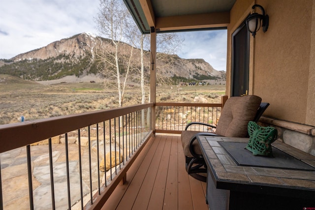 138 Silver Sage Dr, Crested Butte, CO 81224 - wooden terrace with a mountain view