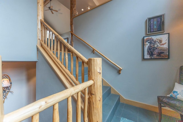 138 Silver Sage Dr, Crested Butte, CO 81224 - stairs with baseboards, tile patterned flooring, and ceiling fan