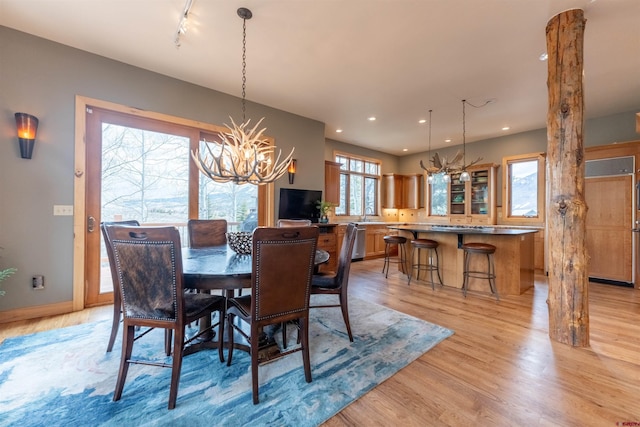 138 Silver Sage Dr, Crested Butte, CO 81224 - dining area featuring recessed lighting, light wood-style flooring, baseboards, and a notable chandelier