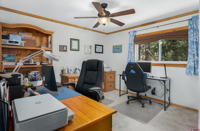 office featuring a ceiling fan and baseboards