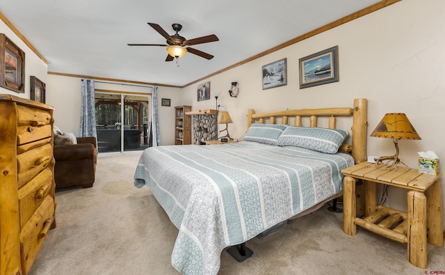 carpeted bedroom featuring a ceiling fan, crown molding, and access to exterior